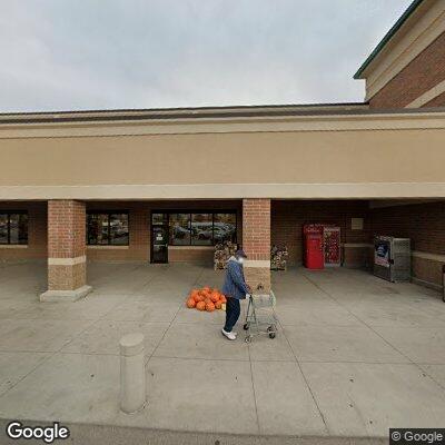 Black male inside store with backpack full of items