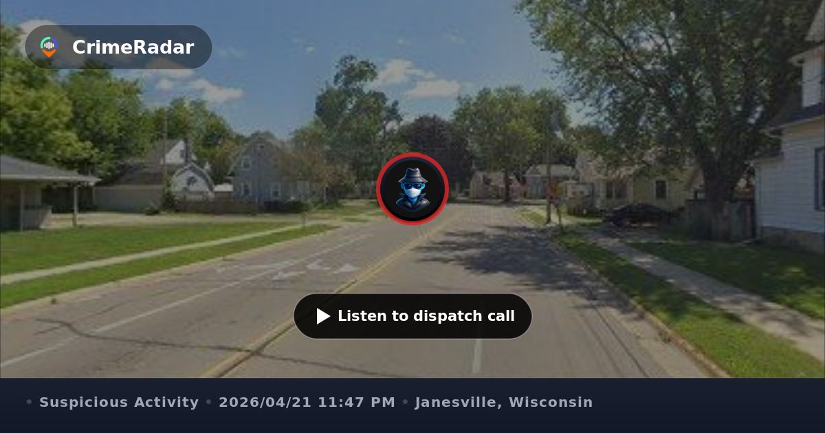 Blue car stopped with lights off at intersection, Janesville WI ...