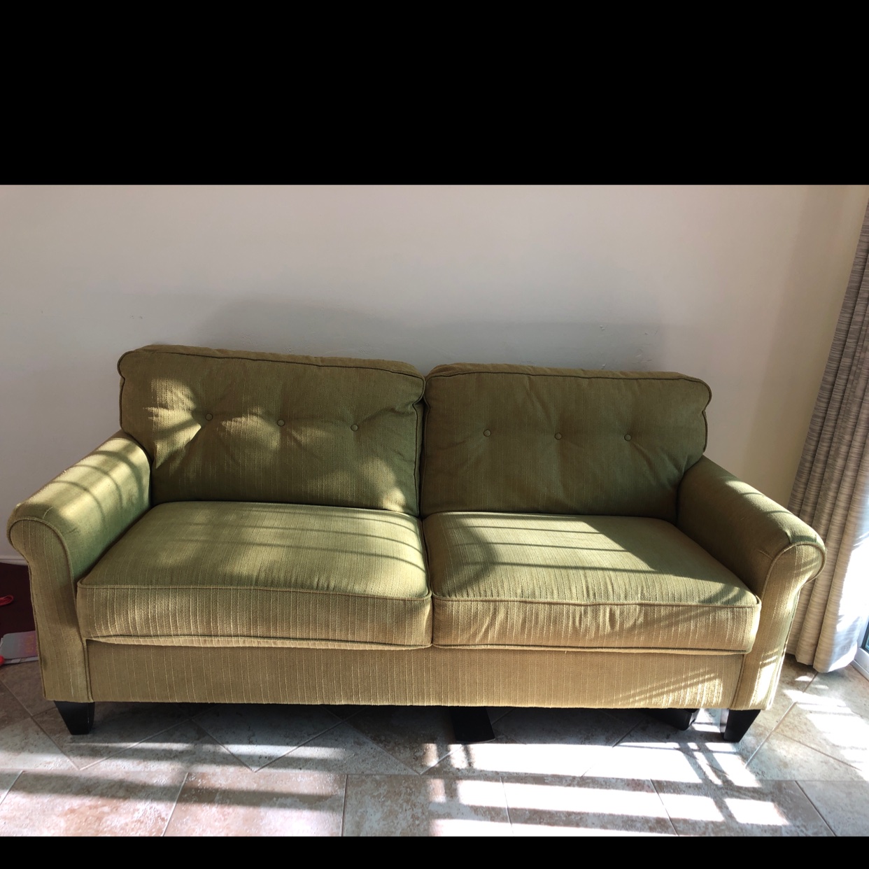 green lazy boy couch