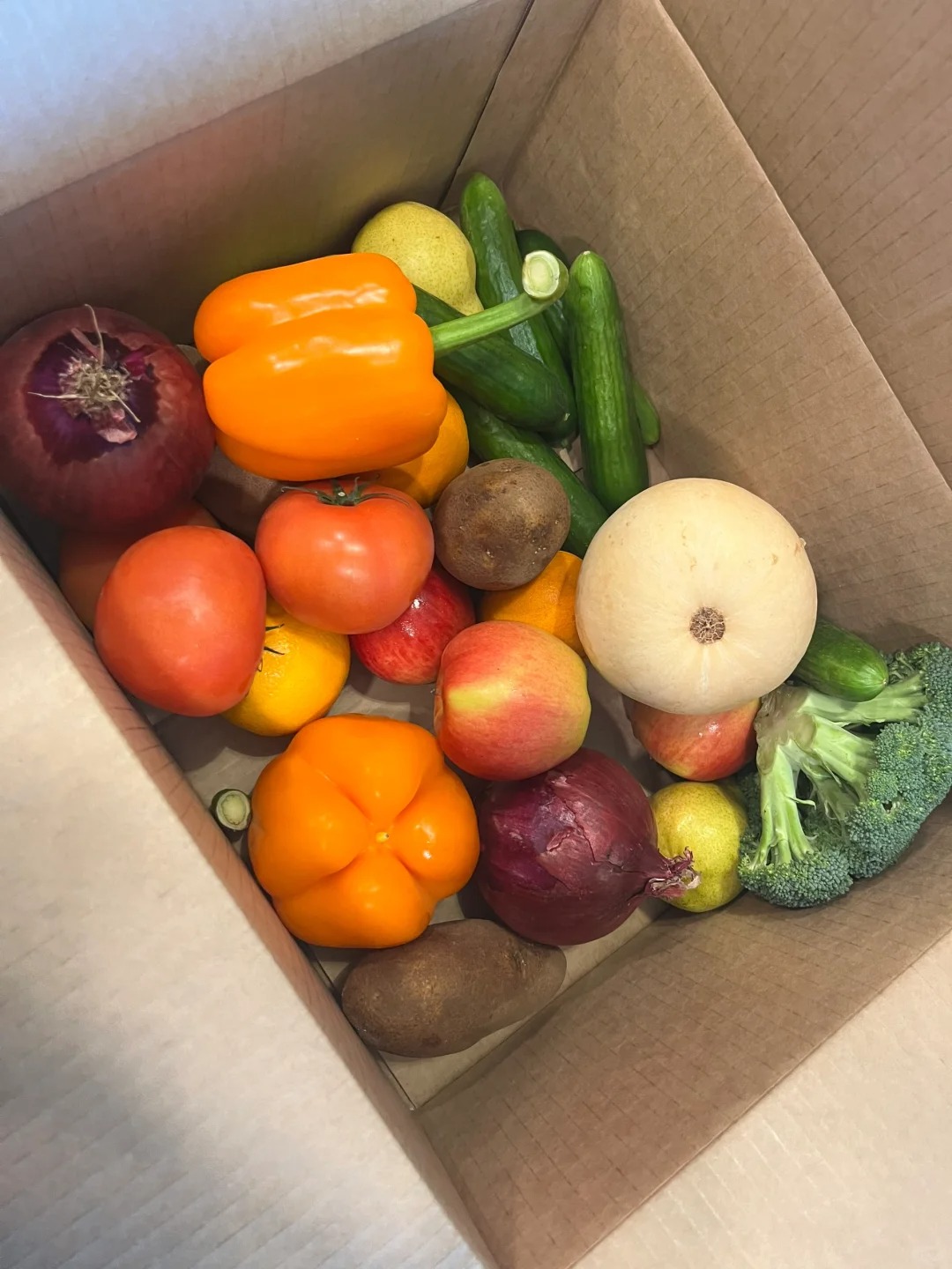 Guess how much it is for this weekly delivery of fruits and vegetables.