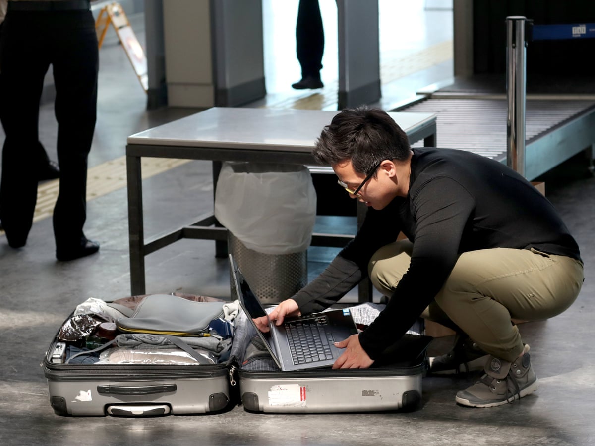 carrying 6 laptops through big airports with a bad heart