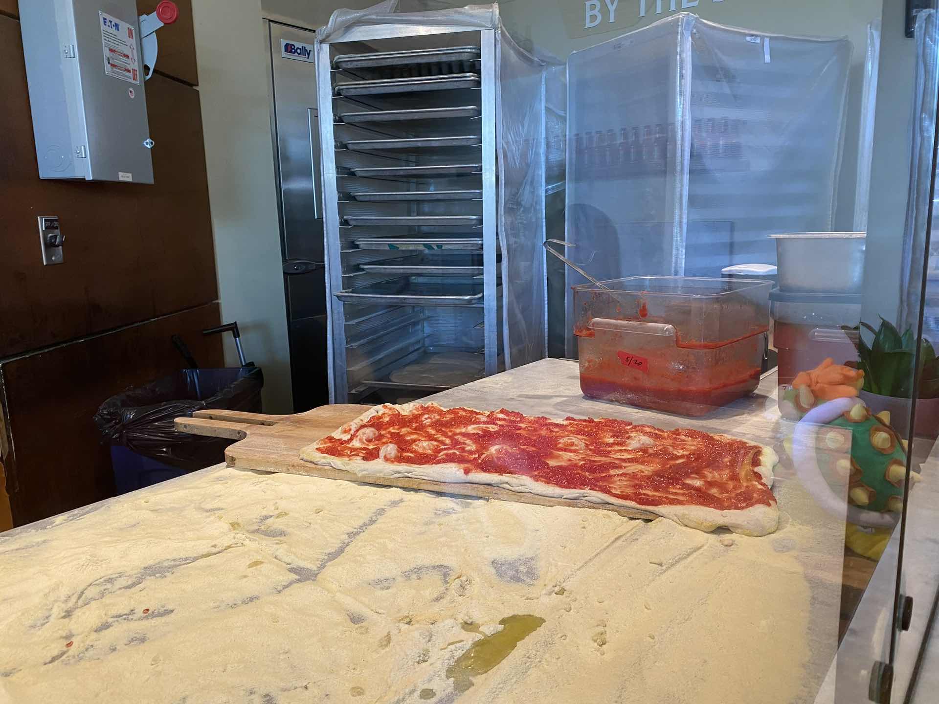 Sliced Italian BURRATA pizza at Bay Area