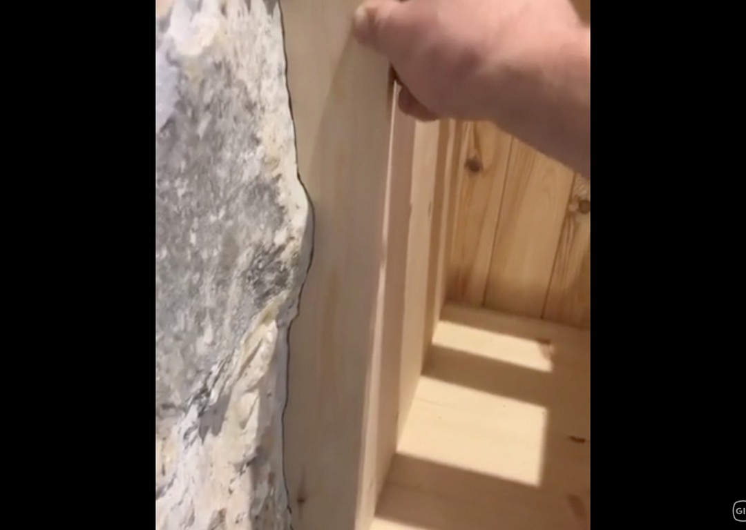 How to fit wood perfectly to rough walls like this