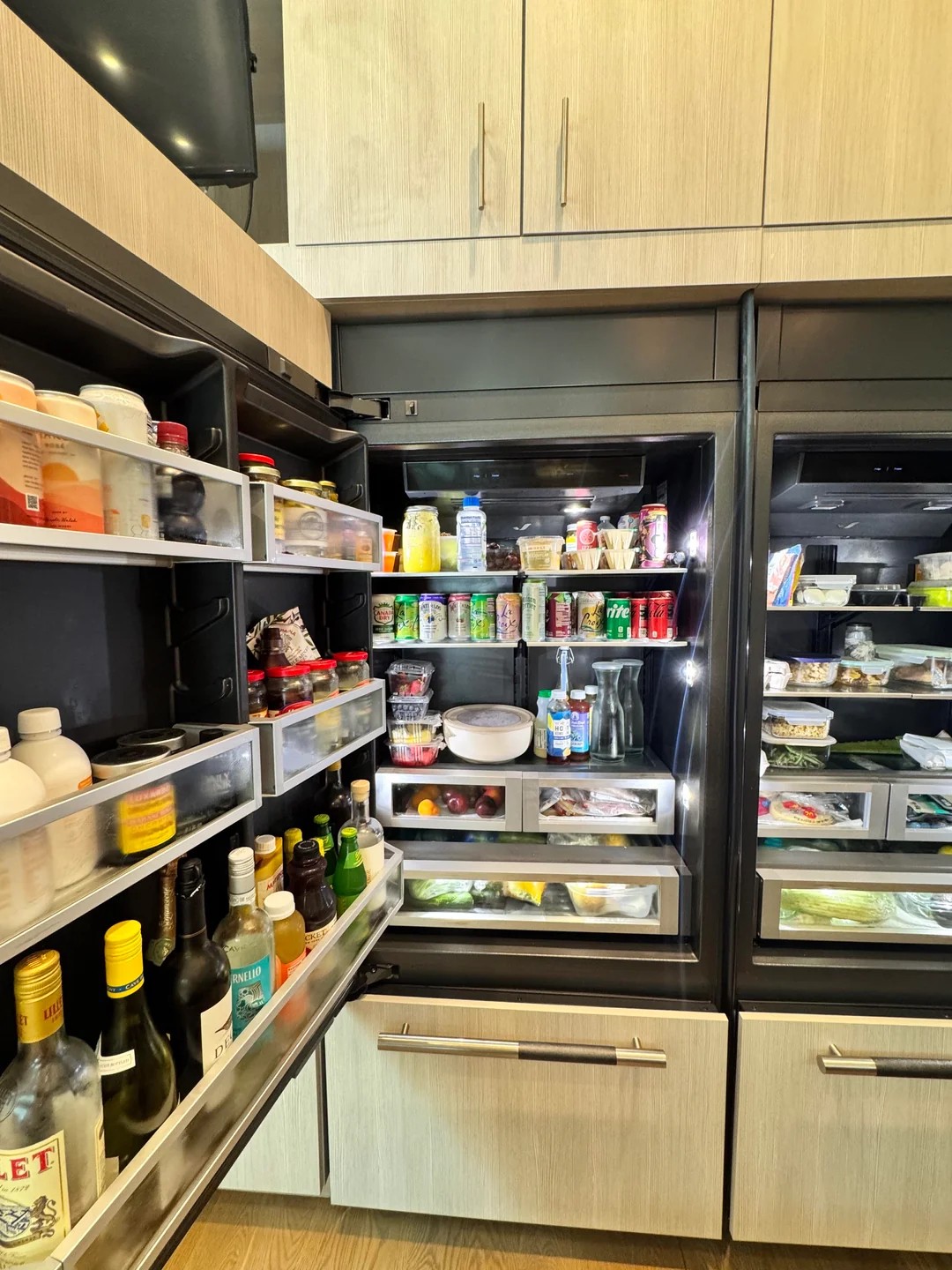 What things can you tell from this family's refrigerator? 