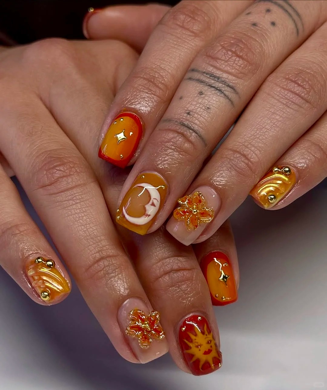 Celestial manicure inspo: sun, moon, and stars🌞🌛⭐️