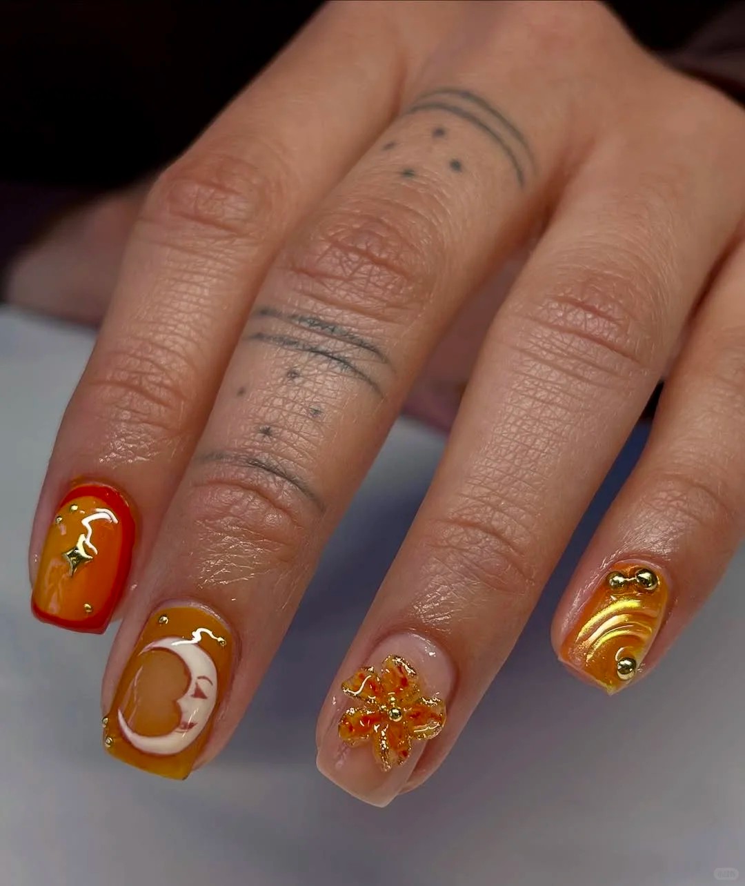 Celestial manicure inspo: sun, moon, and stars🌞🌛⭐️