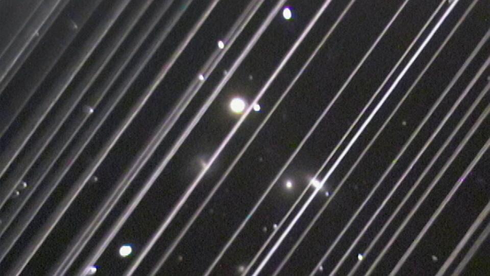 Starlink Satellites Are Photo-Bombing Space Pics