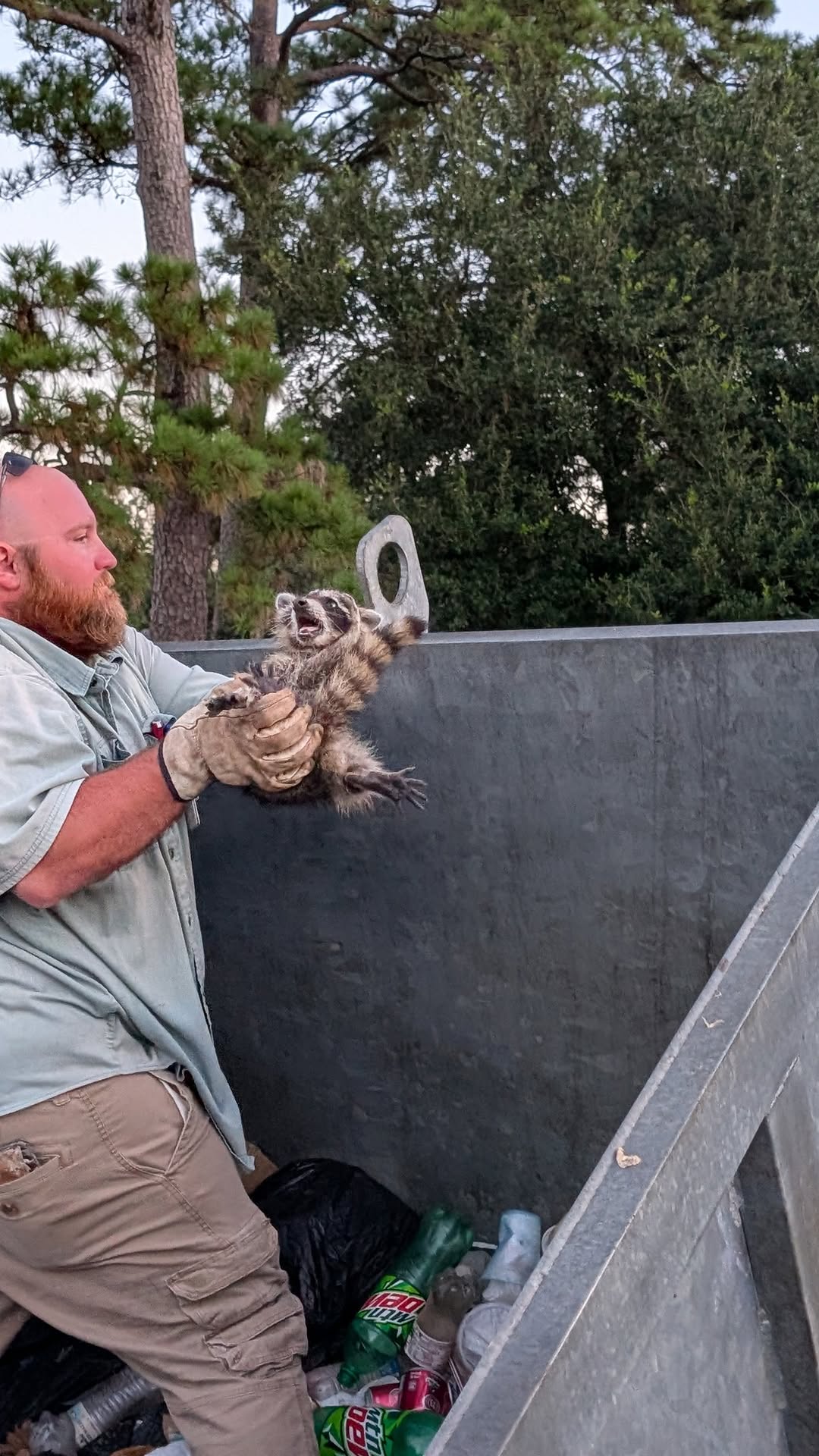 Vidor crew’s wild raccoon rescue in a dumpster
