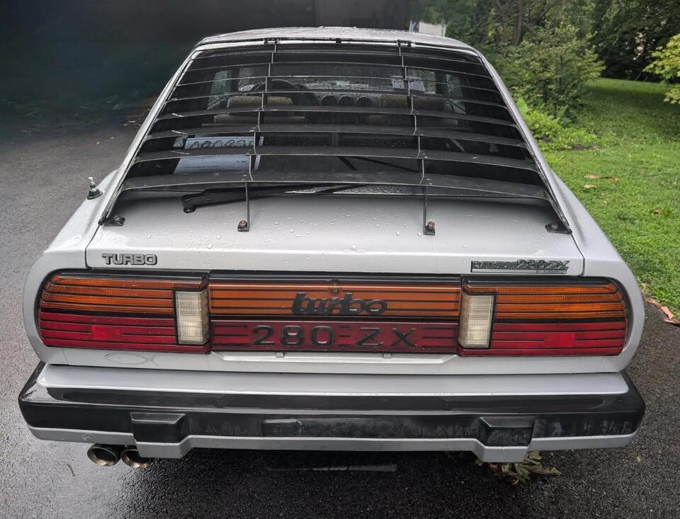 Bloomington’s coolest garage: Cadillac meets Datsun