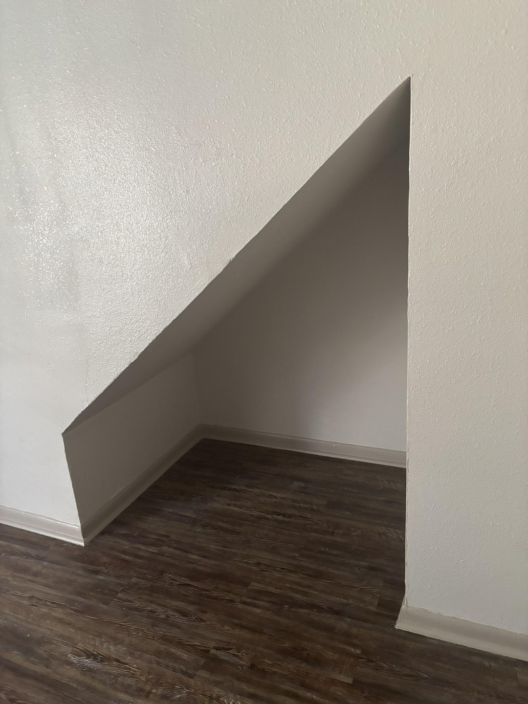 Got a weird under-stairs nook. what would you do with it?