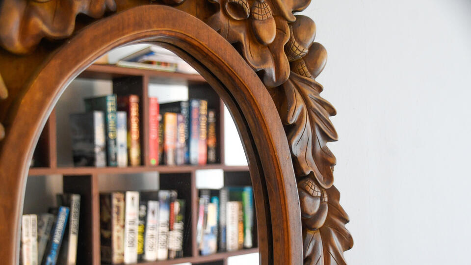 Turn That Old Mirror Frame Into a Towel Rack!