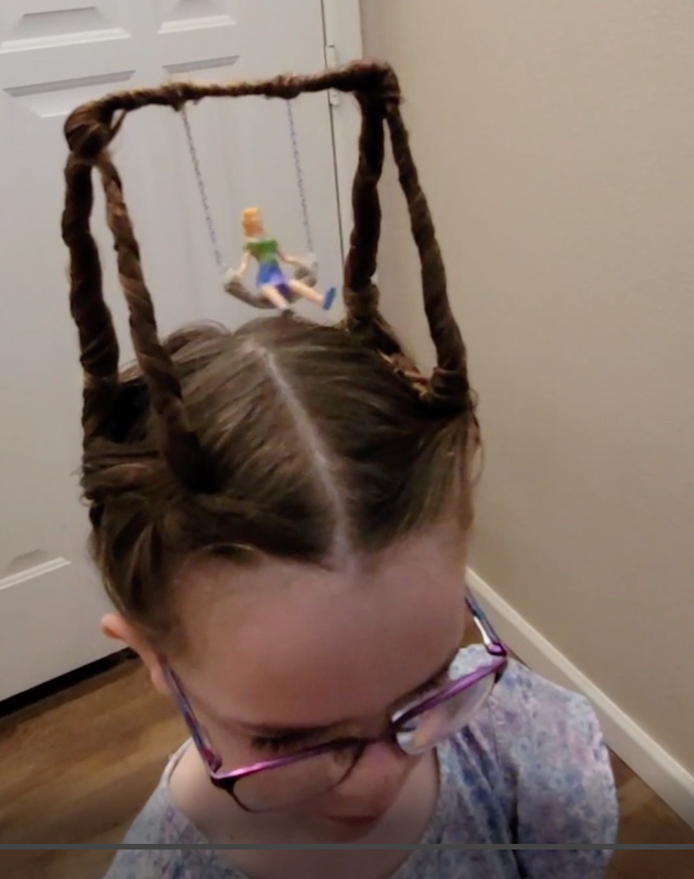 It's Crazy Hair Day at her school. And of course she'll win by just one vote