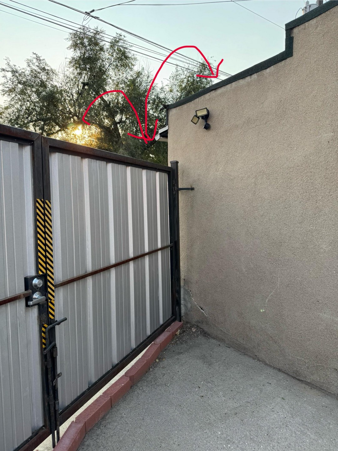 My neighbors' kids keep jumping on my fence to get on the roof of my garage