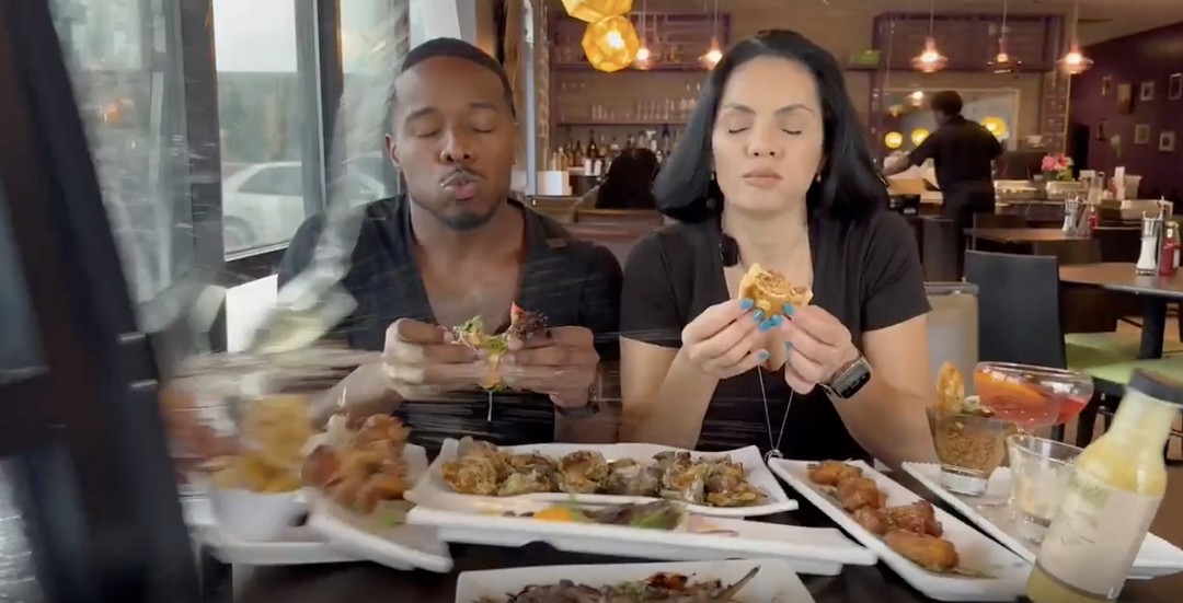 Food influencers were hit by a car while reviewing a burger inside a restaurant