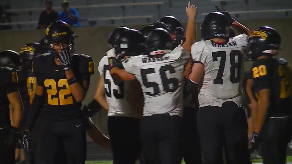 Warsaw edges Snider in wild finish