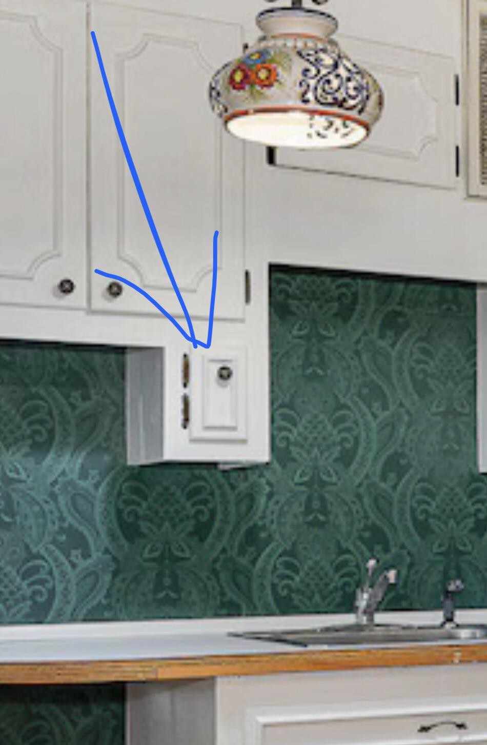 What Is This Tiny Cabinet For?
