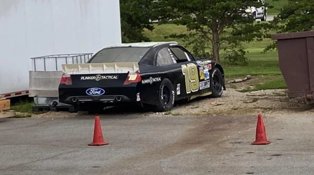 someone's college has jason leffler’s 2012 michigan car just sitting in the back parking lot
