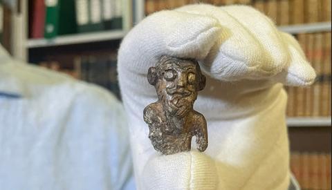 Viking 'Portrait' Unveiled: King or Just a Board Game Piece? 🧐