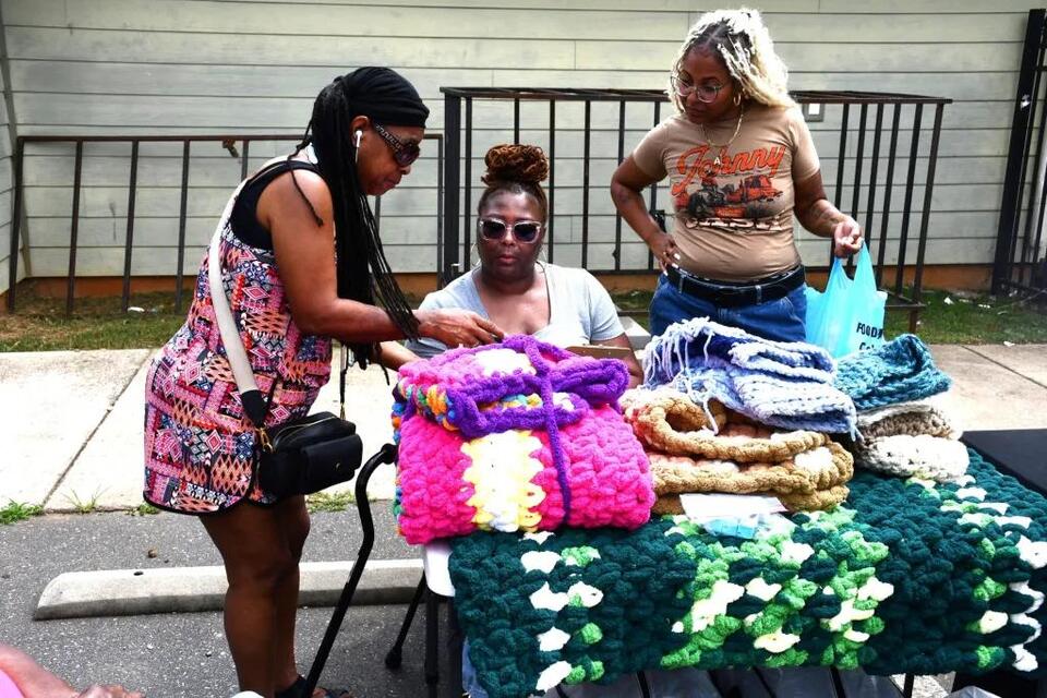 Alumni return to uplift west Charlotte