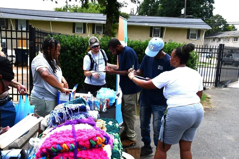 Alumni return to uplift west Charlotte