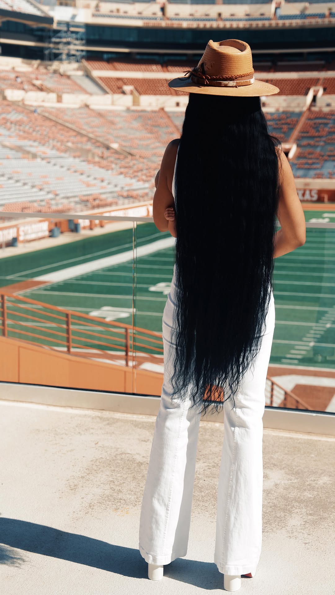 Texas pride on display: Loreal Sarkisian’s game day style