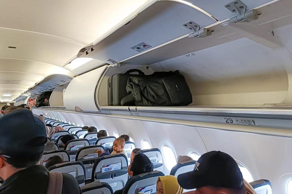 Plane Drama: Overhead Bin Shoe Showdown!