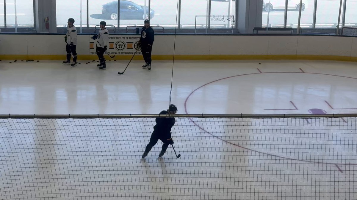 Bruins players step up as captain practices return