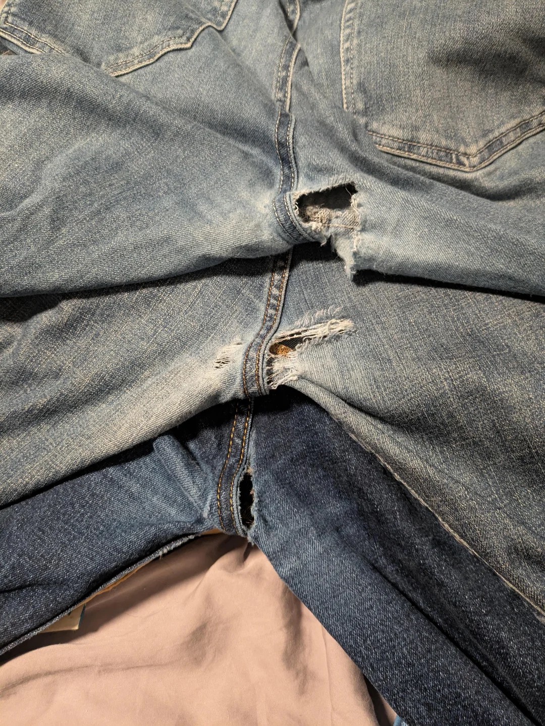 all of his favourite pairs of jeans ripped in about the same place