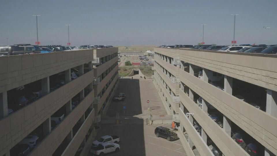 Denver flyers fume over airport parking fees