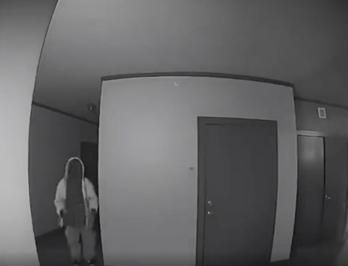 Creepy guy is caught on ring camera standing outside woman's apartment every night for nearly a month.