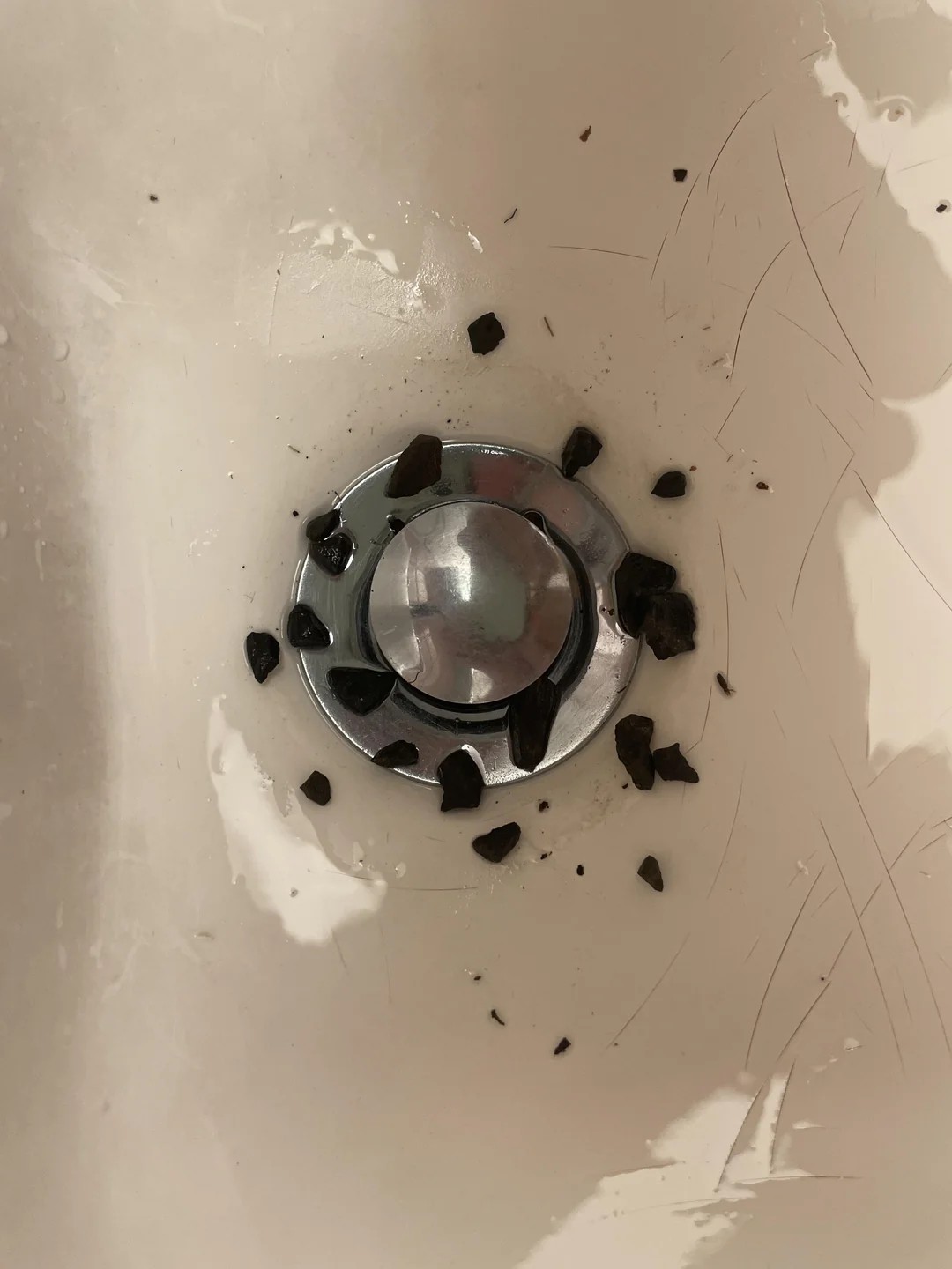 Keep finding pebbles in sink - any explanation?