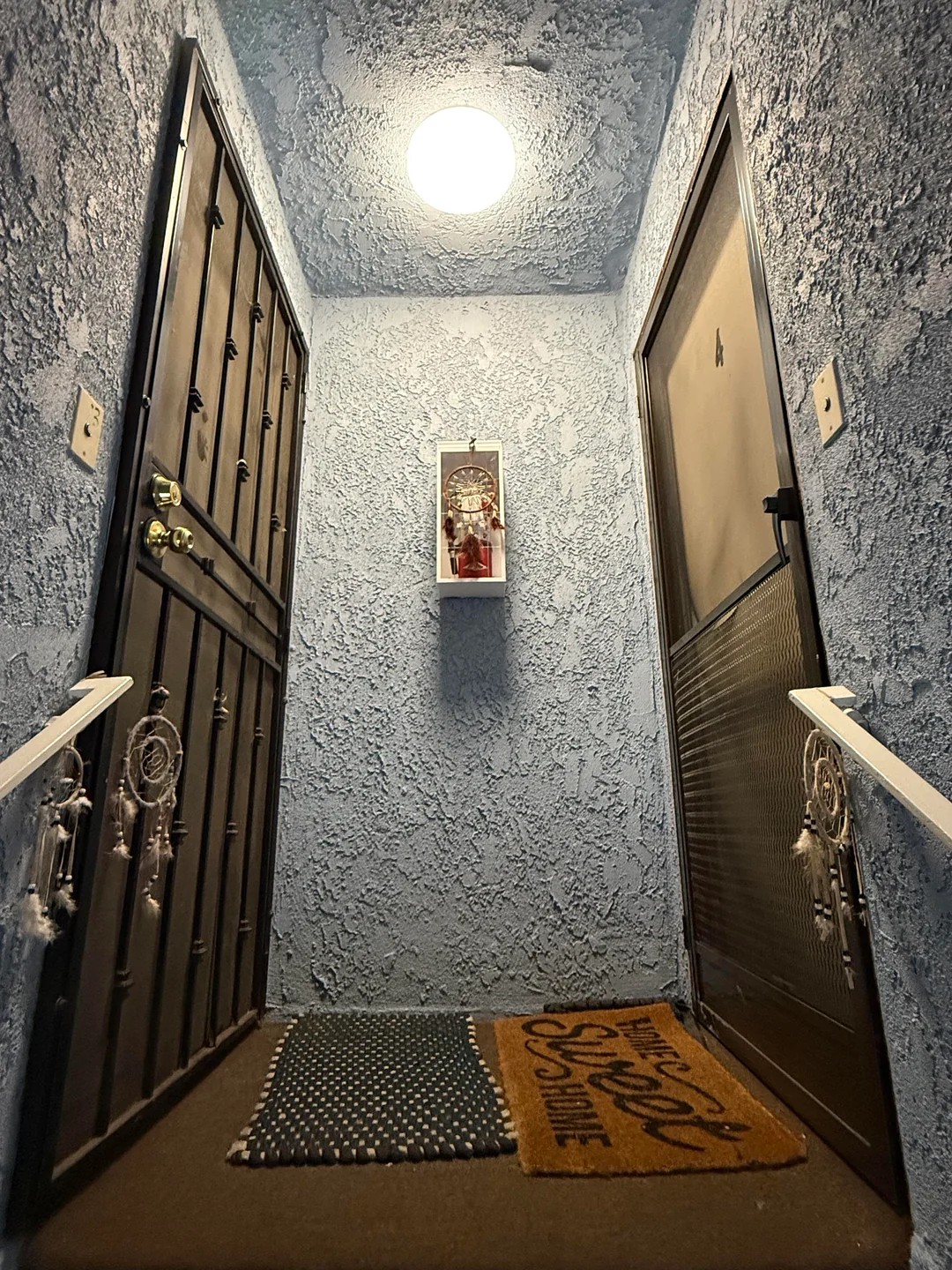 In the middle of the night, someone tied dream catchers on my neighbor’s and my apartment entrance/doors. We don’t know who or why.