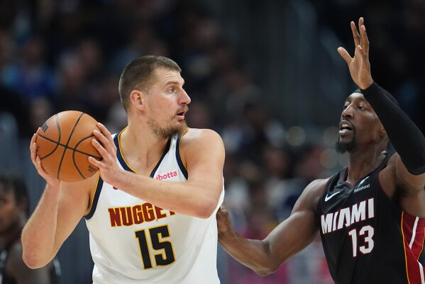 Jokić hits another triple-double as Nuggets roll over the Heat