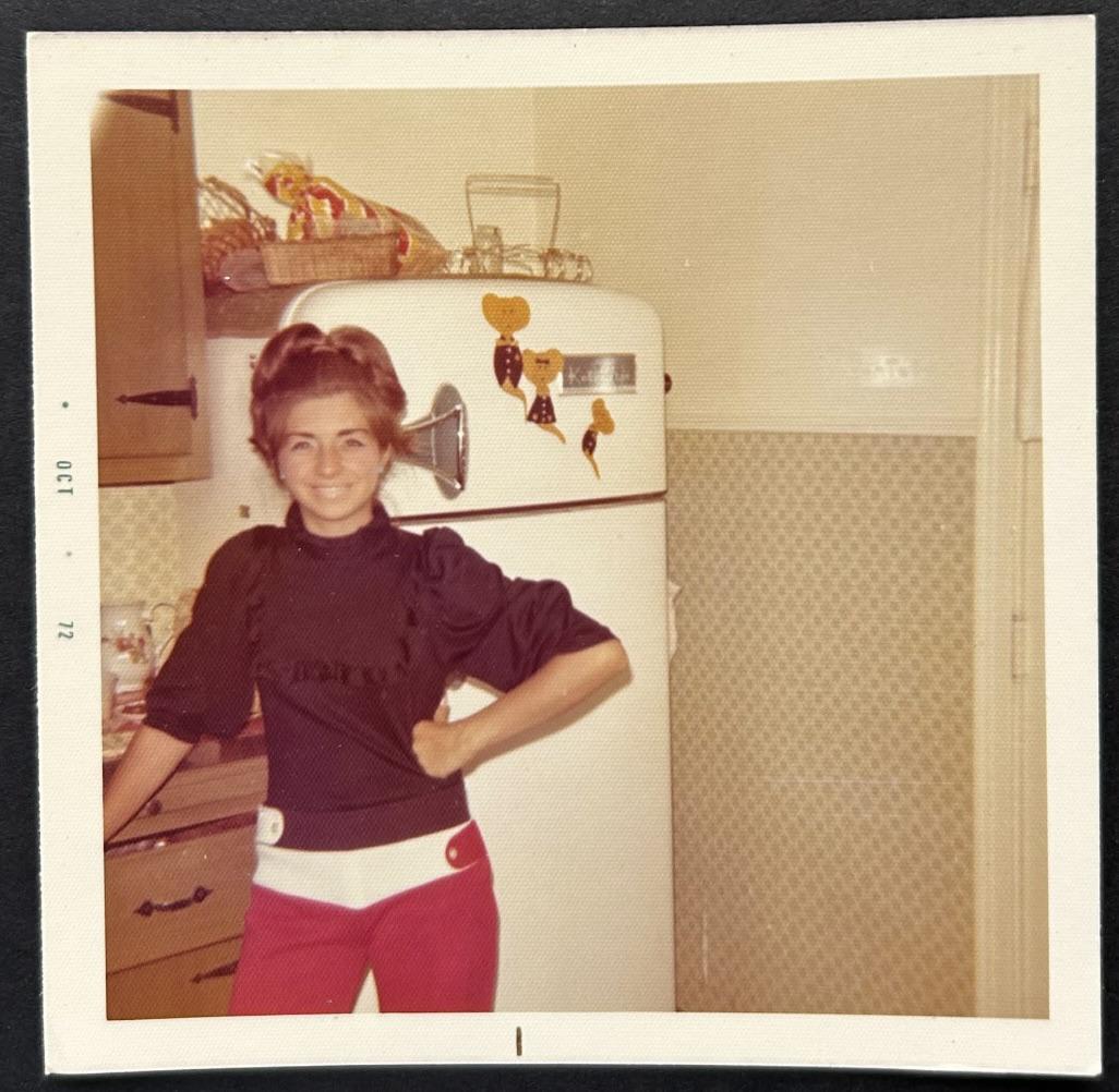 1972, a lady in her kitchen
