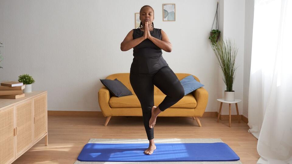 3 Yoga Moves for Achy Joints—No Sitting Needed!